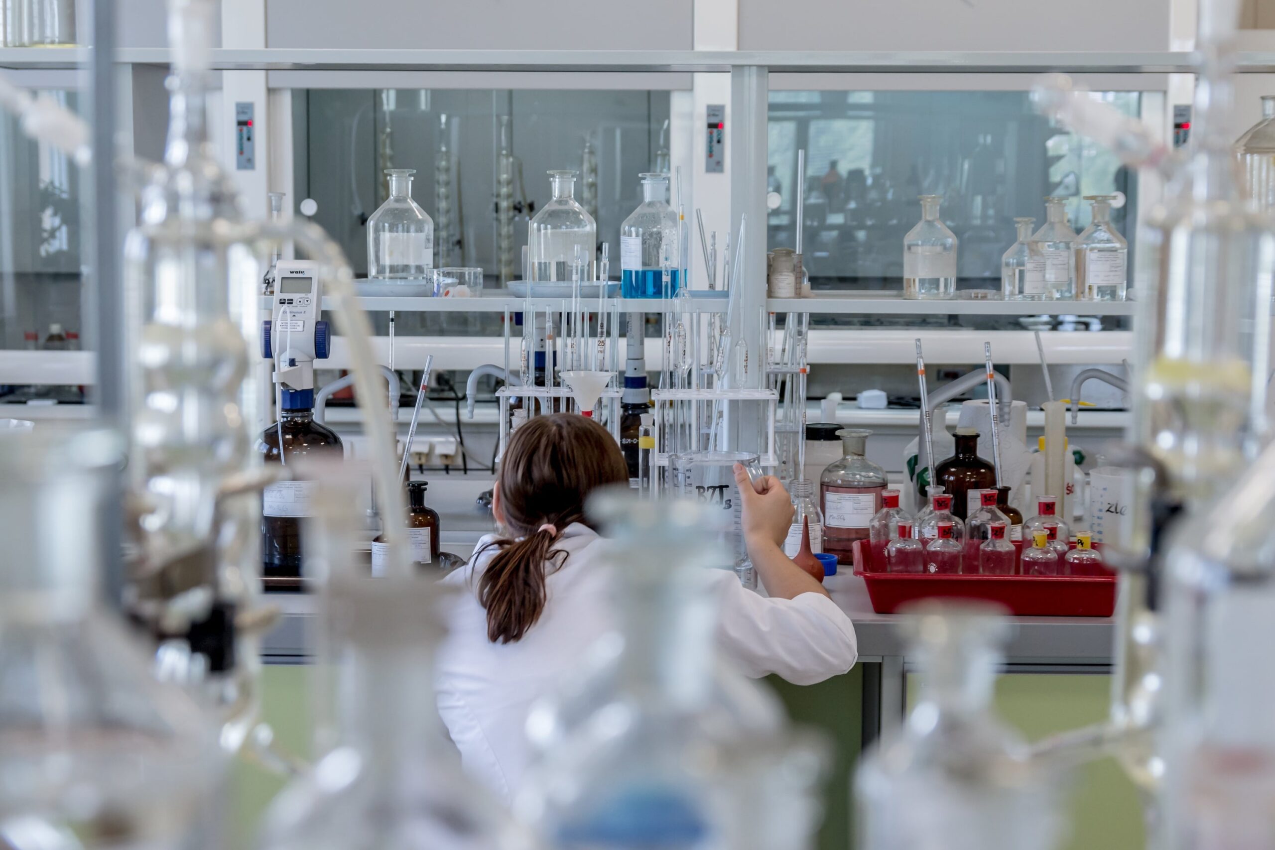 Image of a science lab with scientists working.